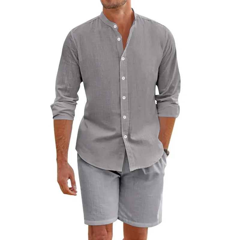 Men's dark grey linen-blend short sleeve shirt and drawstring shorts summer set laid flat.