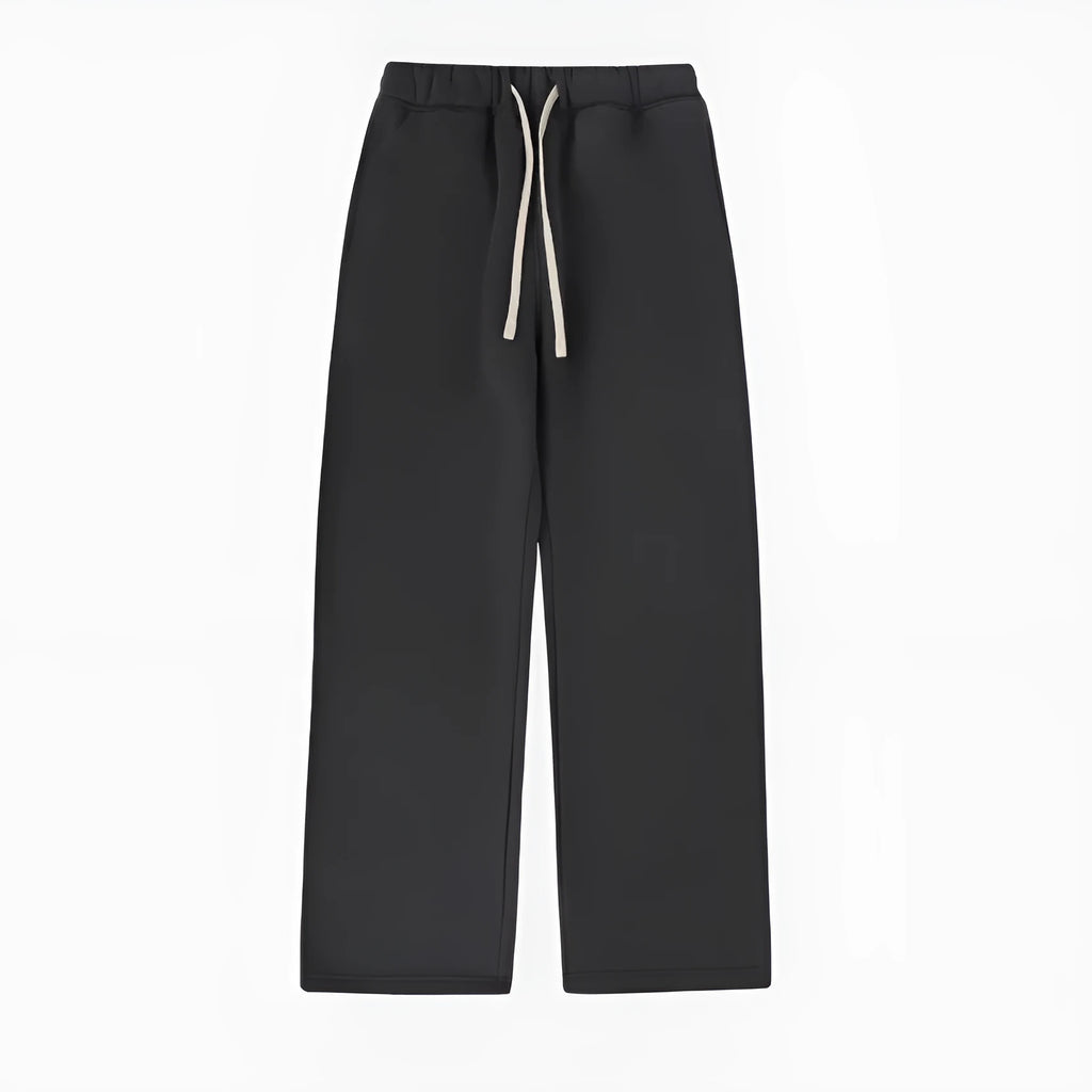 Men's black fleece-lined drawstring sweatpants with an elastic waistband, shown in a loose fit.