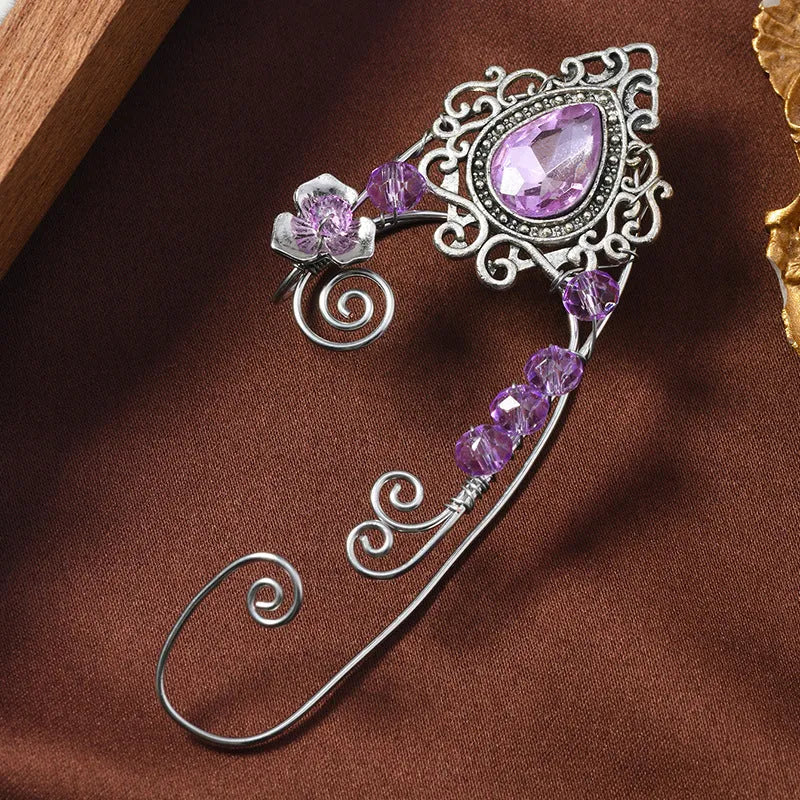Hand-woven purple crystal clip-on earrings in a right and left pair with mixed material vintage design
