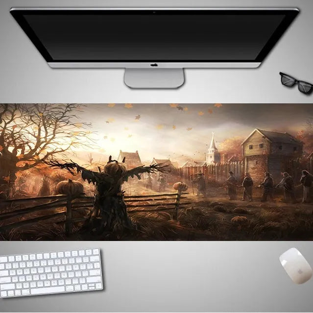 Oversized Halloween-themed mouse pad on desk with non-slip rubber cloth base and large surface area