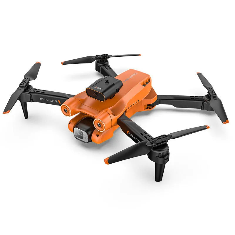 Black and orange quadcopter with HD camera, folded to 4.5 cm size, showing remote control and spare blades