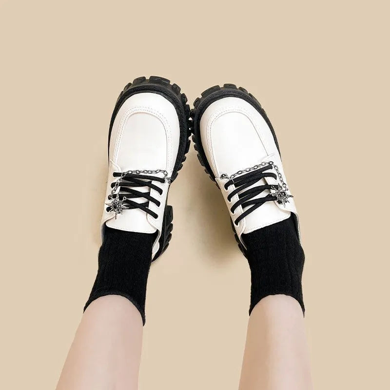 Women's Duke Asterism coloured loafers with metal cross strap and round toe in college style
