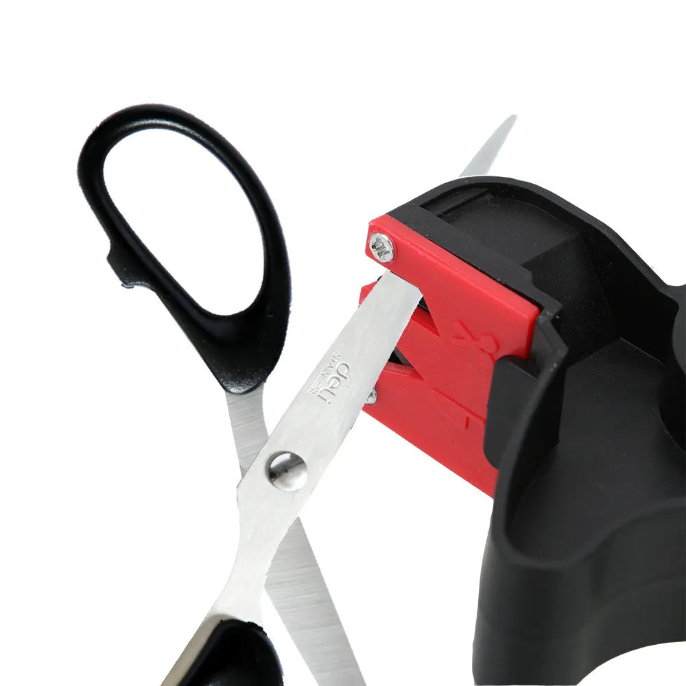 Black handheld tungsten steel knife and scissor sharpener on a kitchen counter