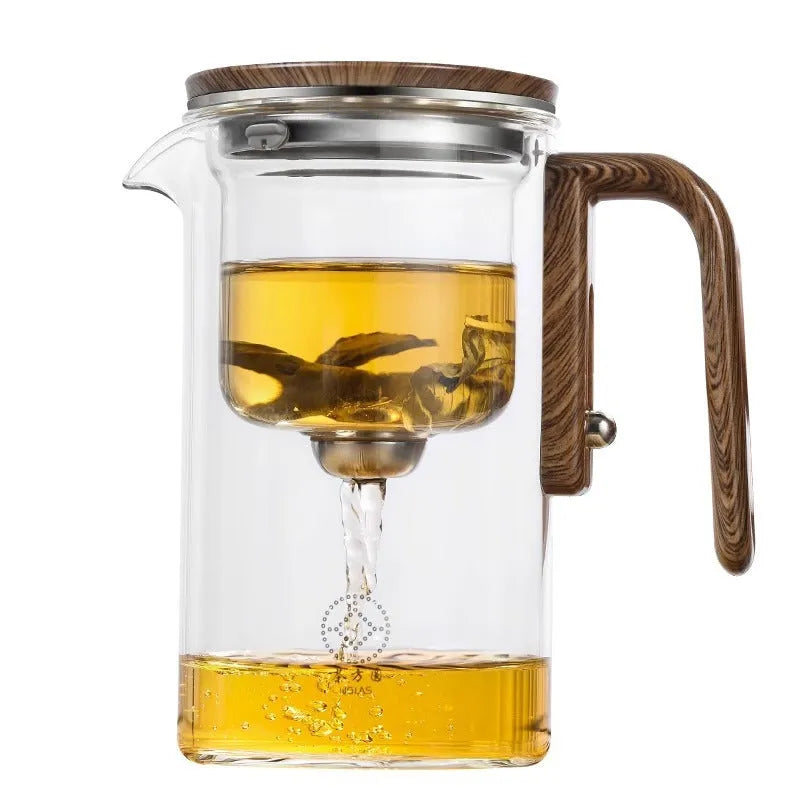 Glass teapot with wooden handle showing magnetic tea separation system and Chinese style design