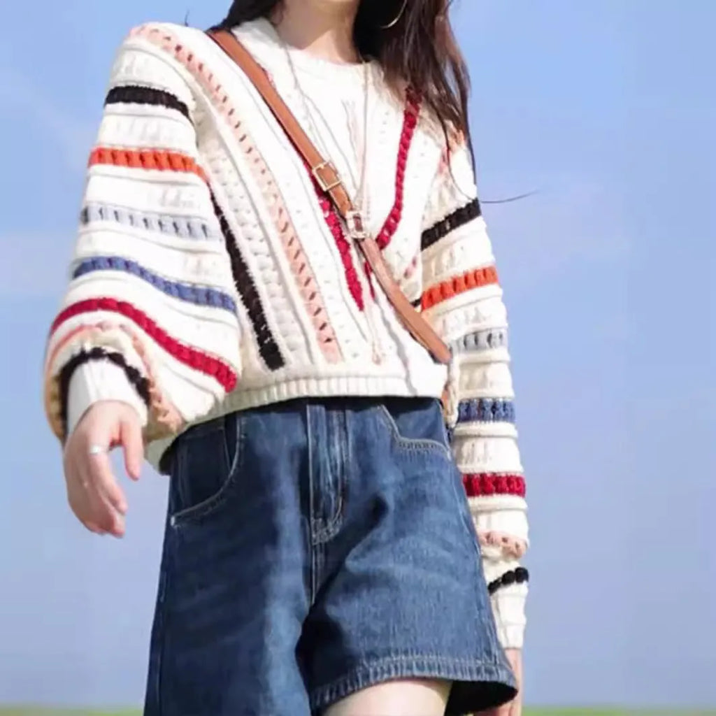 Rainbow striped pullover sweater with batwing sleeves and hollow knit texture