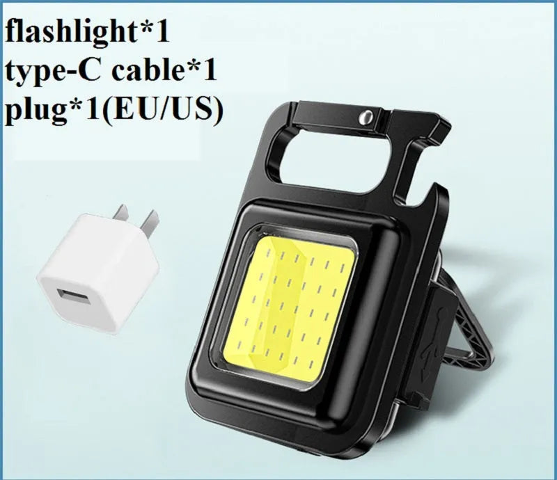 Mini keychain flashlight with COB LED, 400 lumens, USB rechargeable, three modes, hook and bottle opener.