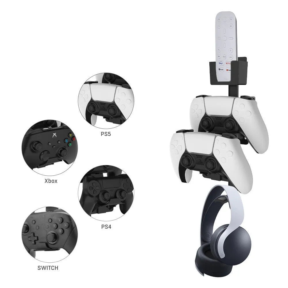 White wall-mounted storage hook holding PS5 controller and gaming headset