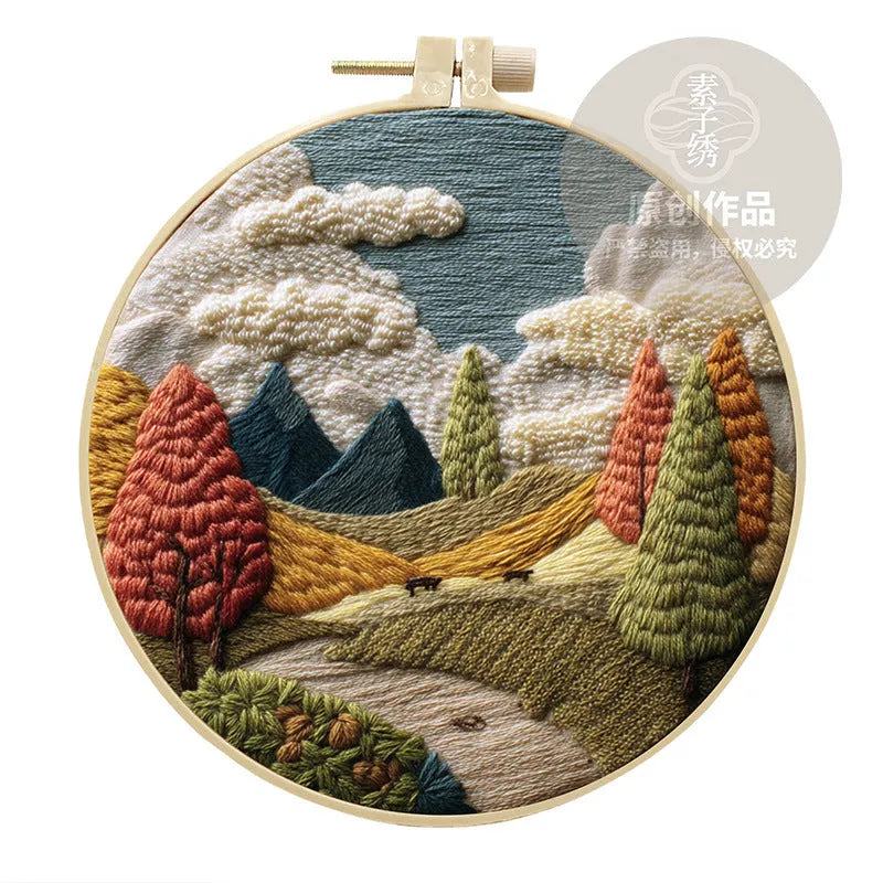 Embroidery DIY landscape kit with bamboo-style frame, pre-printed cotton fabric, embroidery threads, and needles