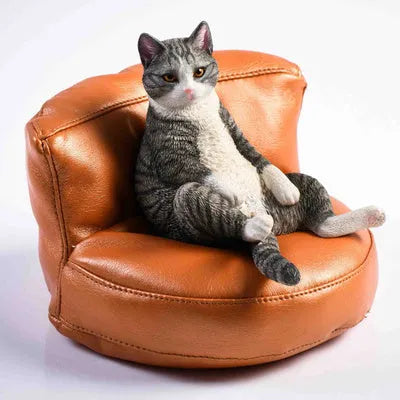 7.5cm high resin lazy cat ornament with sofa on car dashboard