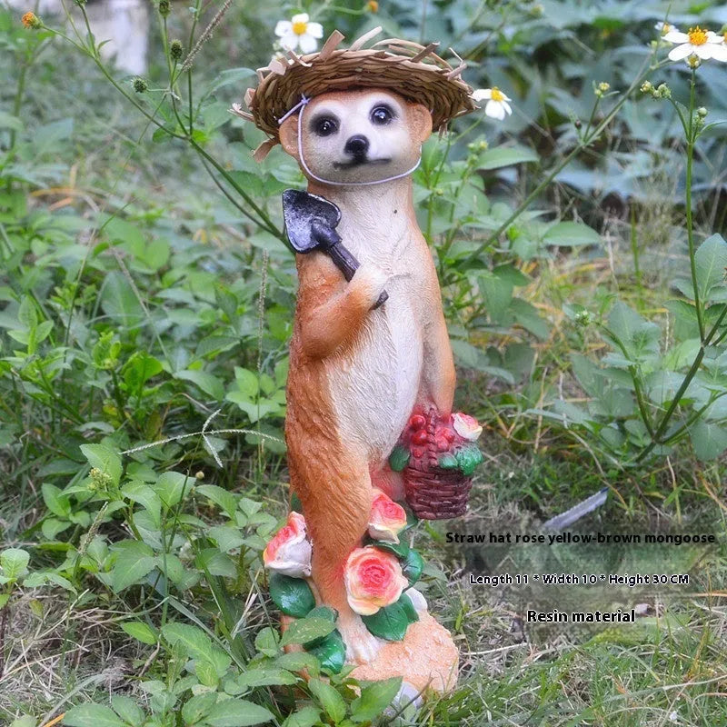 Straw hat mongoose ornament in resin and plastic with detailed animal features and miniature tools