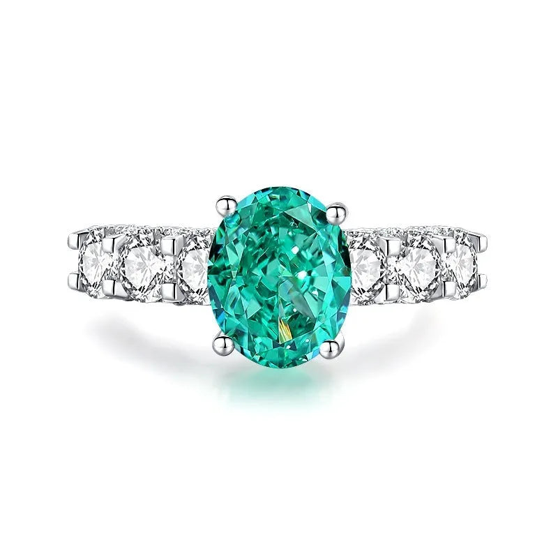 S925 sterling silver emerald ring with geometric shape and high carbon diamond inlay, showing elliptical design.