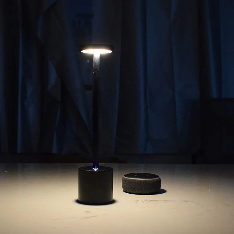 All-aluminium rechargeable LED desk lamp with touch dimming control in silver finish