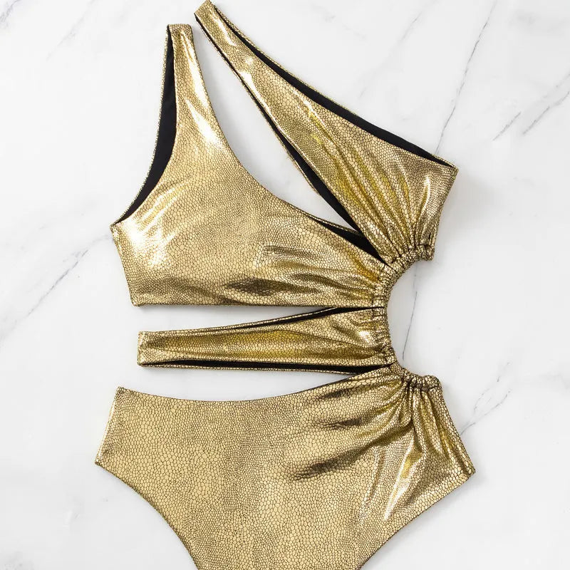 Women's one-piece swimsuit in solid gold colour with backless design and spandex material for high elasticity.