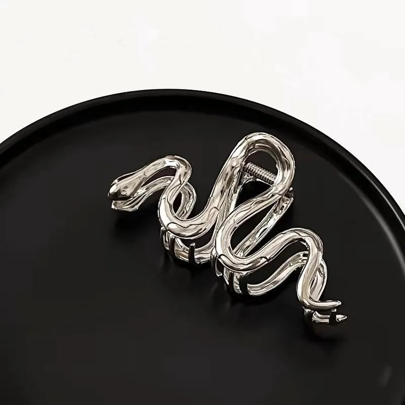 Slytherin serpentine metal hair barrette in silver or gun black, 10.5 cm long.
