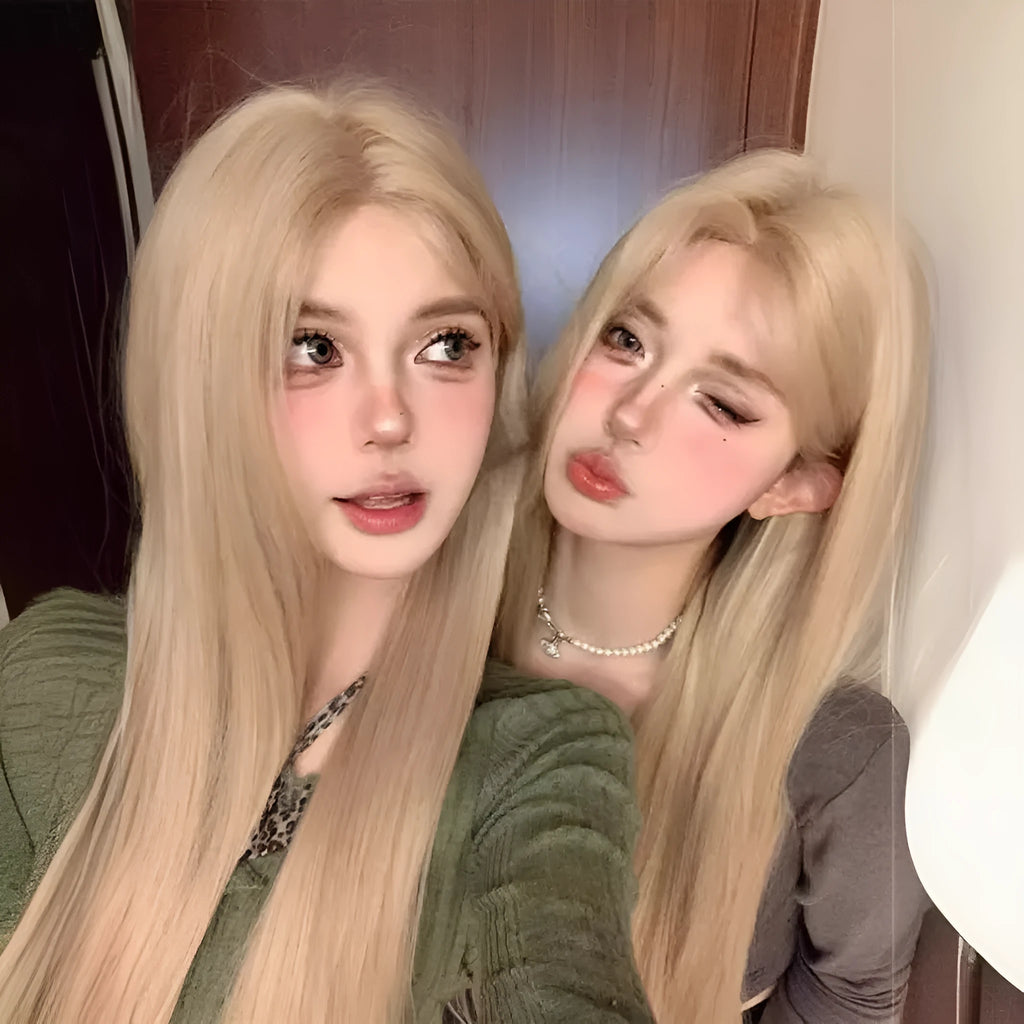 Long straight milk tea blonde synthetic wig on a model, shown with an included hair net.