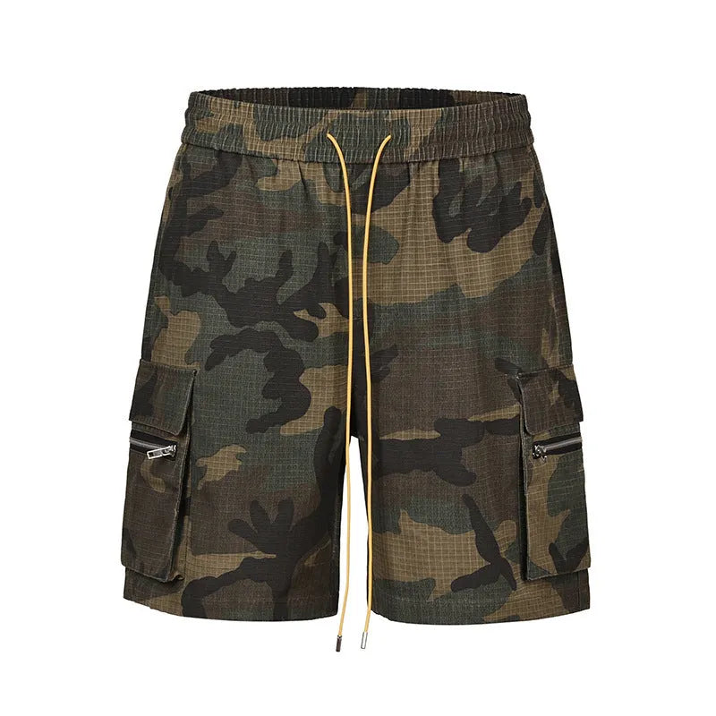 Men's camouflage multi-pocket work shorts showing cropped length and pocket details