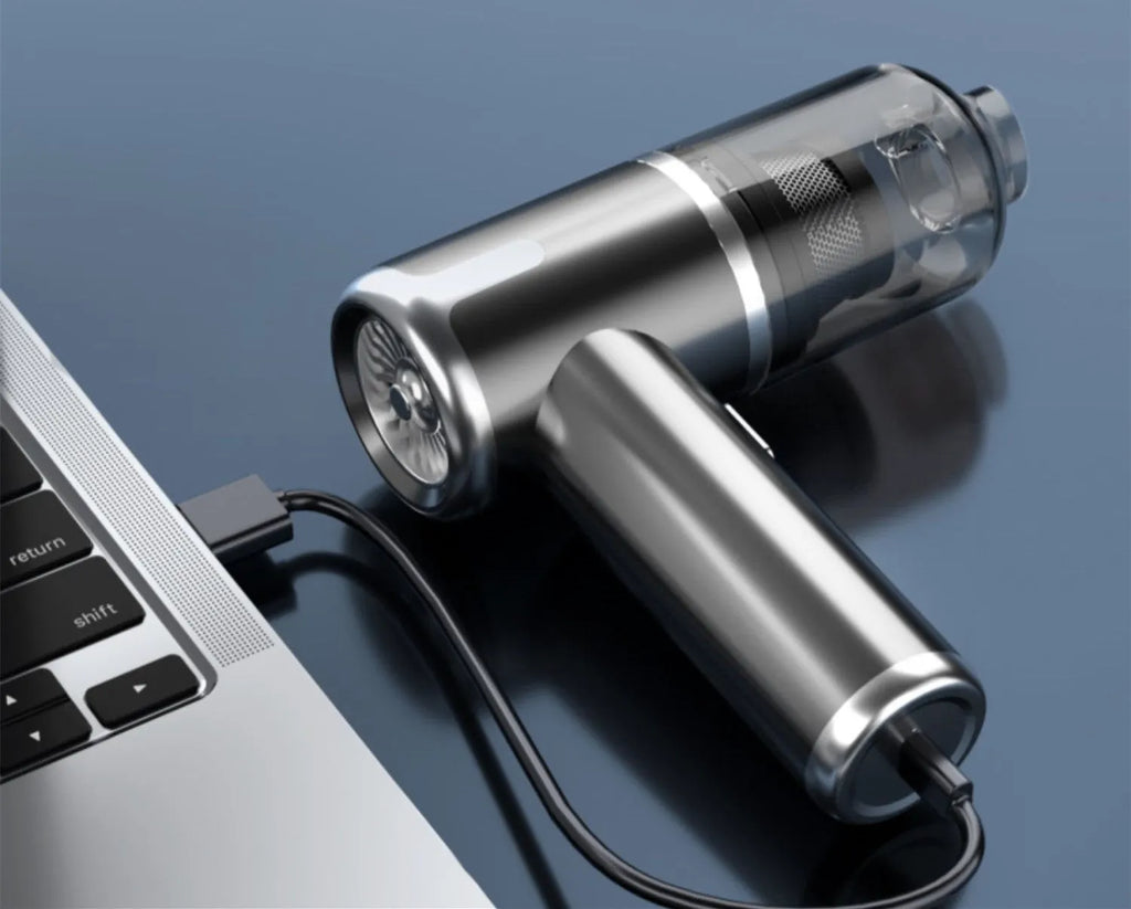XY-2317 wireless handheld vacuum cleaner with attachments and car mount on a table