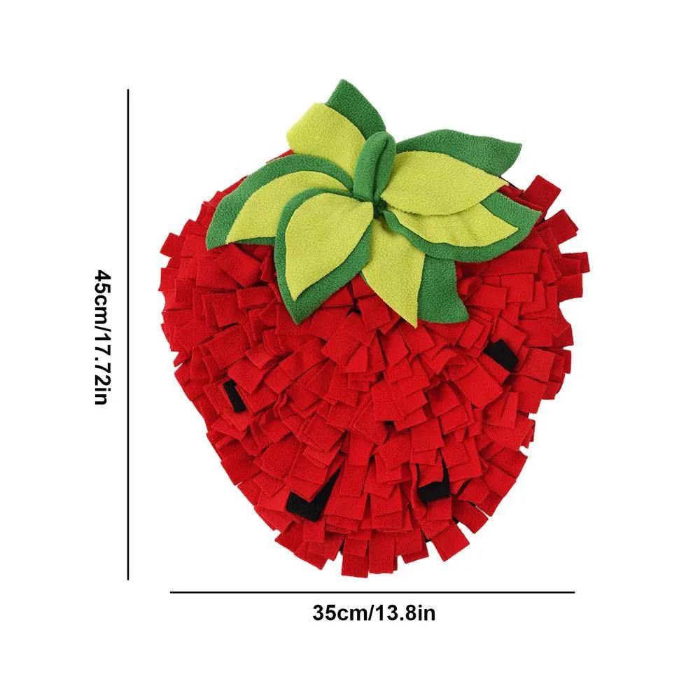 Red and green strawberry-shaped pet slow feeder mat with hiding spots for foraging