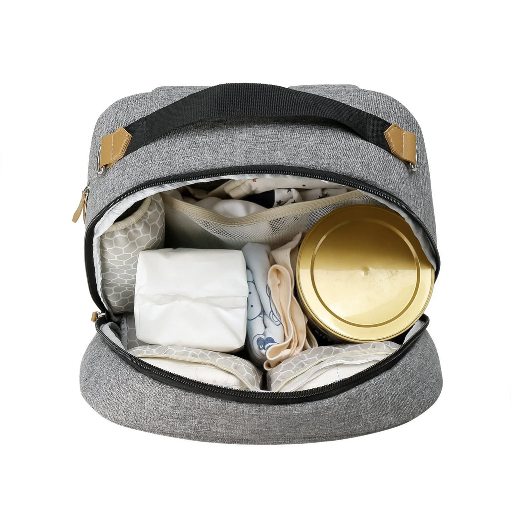 Gray insulated mother and child travel backpack with curved shoulder straps showing multiple compartments