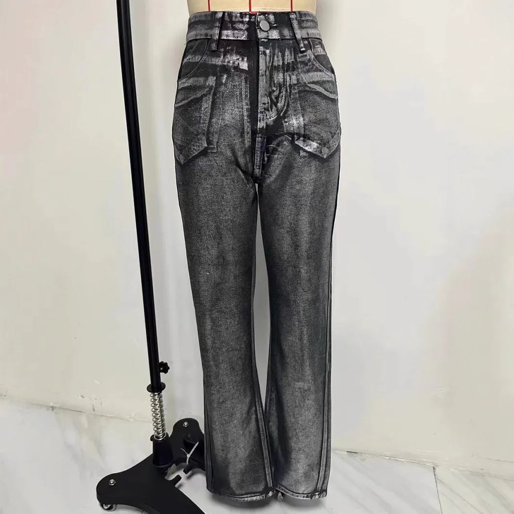 High waisted straight leg blue denim jeans with contrast stitching on a model.