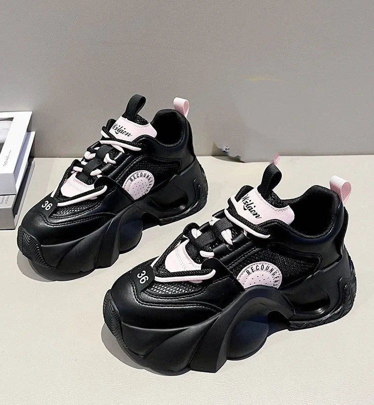 Women's pink sneakers with cross straps, 3-5cm thick sole, and mesh lining for breathable comfort