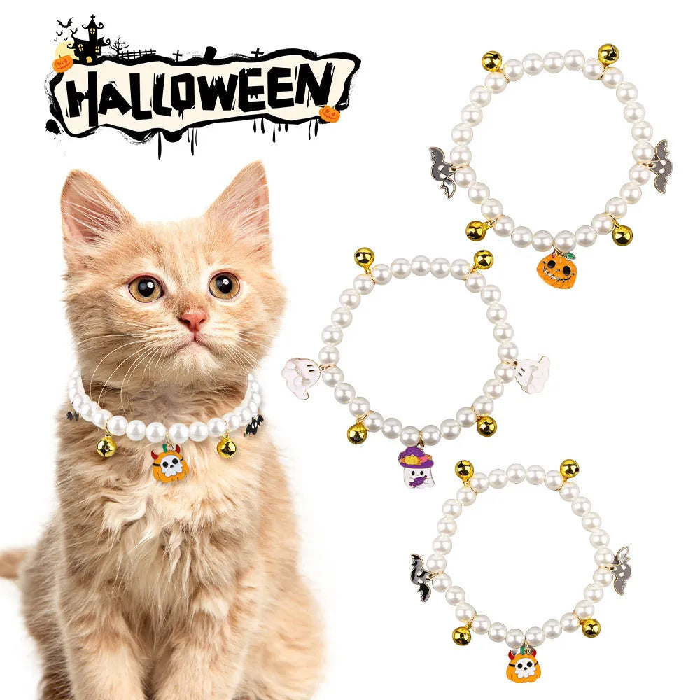 Halloween cat collar with simulated pearls and pumpkin designs in purple ghost, skull, and smiling motifs