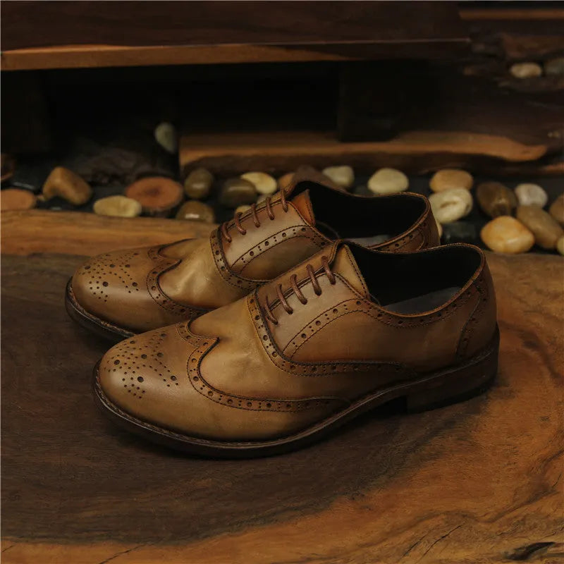 Men's light brown vintage engraved handmade distressed leather shoes with lace-up closure and round toe