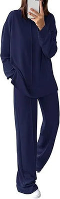 Women's polyester jogging suit set in Army Green, showing long-sleeve top and matching trousers.