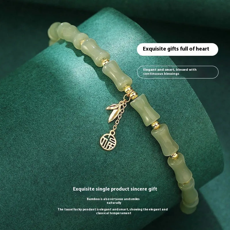 Chinese bamboo jade bracelet and necklace set with green jade details and safety clasp