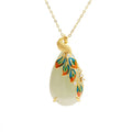 Phoenix pendant necklace with white jade effect and electroplated copper, shown with optional 40cm gold necklace