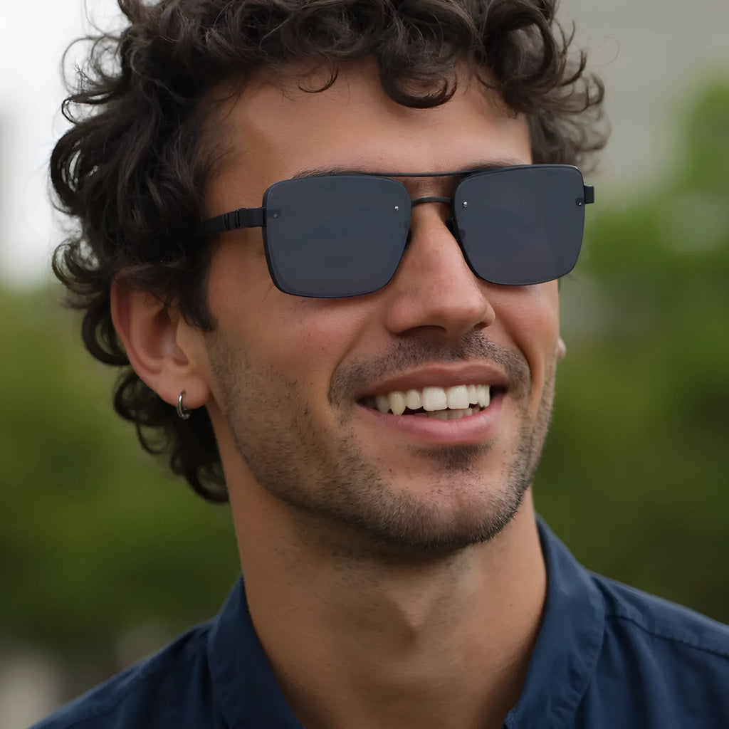 A pair of men's vintage-style sunglasses with UV-protective PC lenses, shown in a gold double gray colour variant.