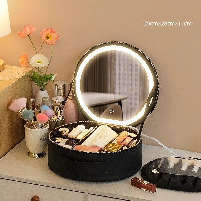 Round pink smart LED makeup bag with mirror lights open, showing internal partitions and adjustable lighting.