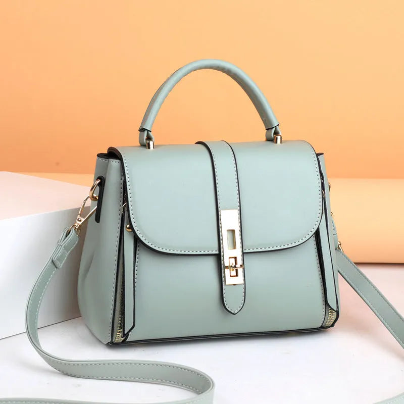 Women's soft PU leather shoulder bag in square vertical design with adjustable strap, showing interior polyester lining