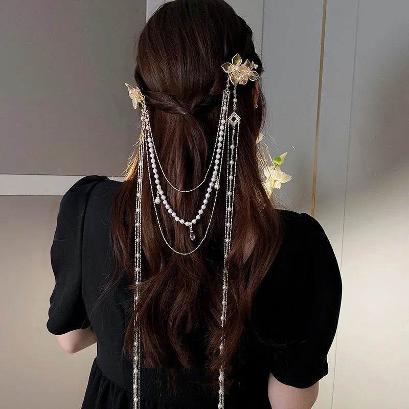 Women's pearl diamond flower long tassel hairpin with gold grip and decorative elements