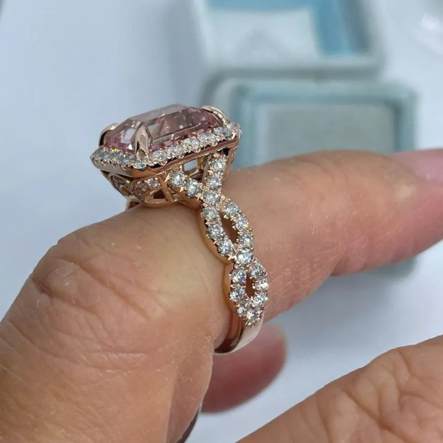 Rose gold electroplated alloy ring with geometric shape design showing angular lines and metallic finish