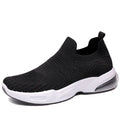 Slip-on sock shoes with mesh lining and PVC sole in black, white, pink, and khaki colours