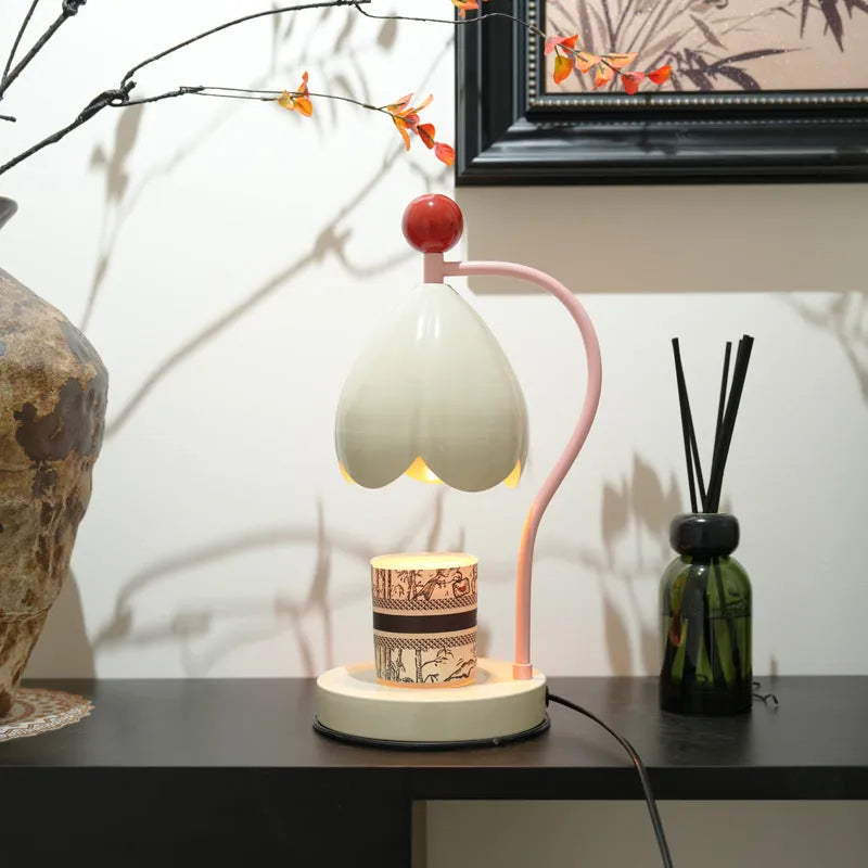 Linglan Melting Wax Lamp in cream white or dark green with metal construction and modern simplicity design