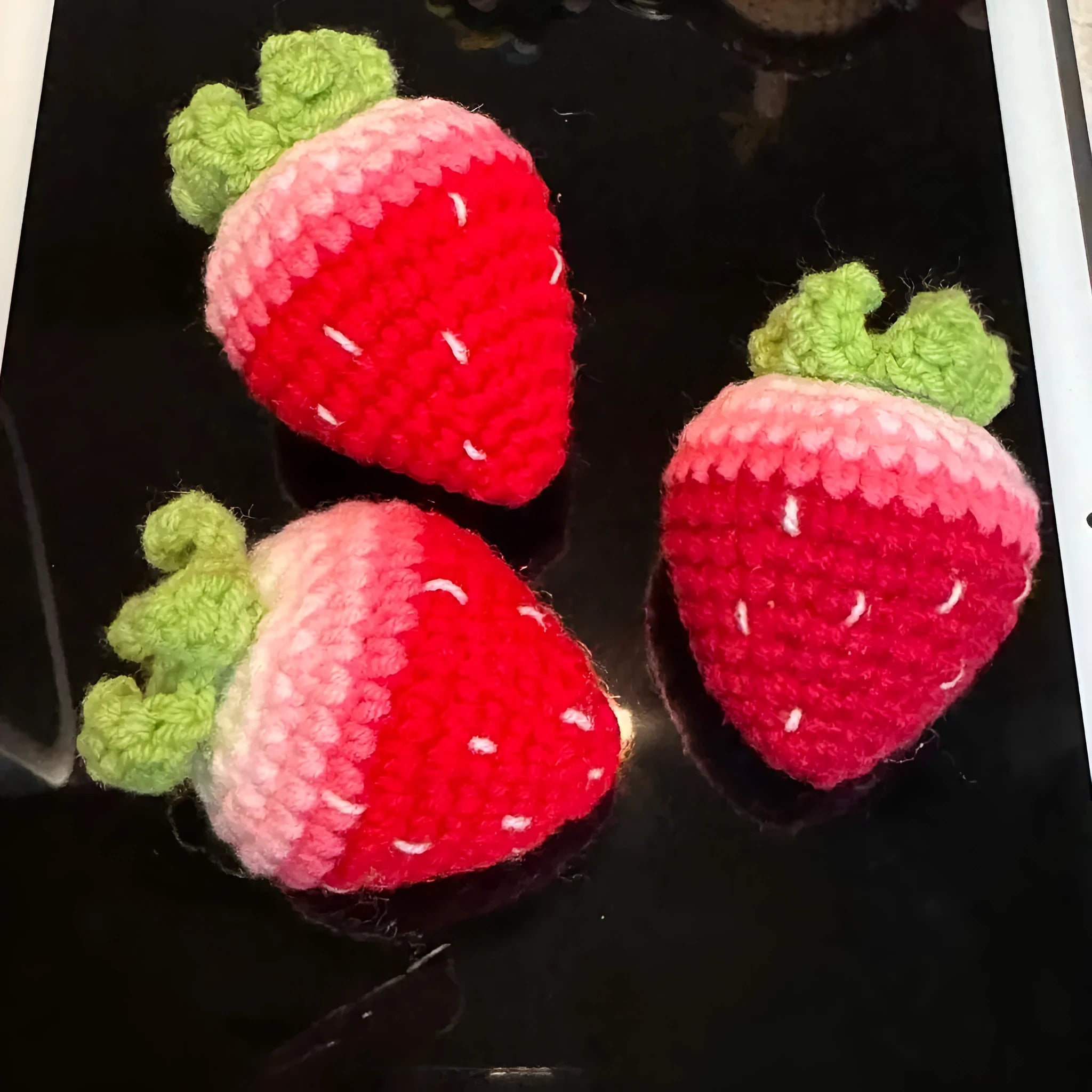 Plush strawberry pendant keychain in pink or red colour
