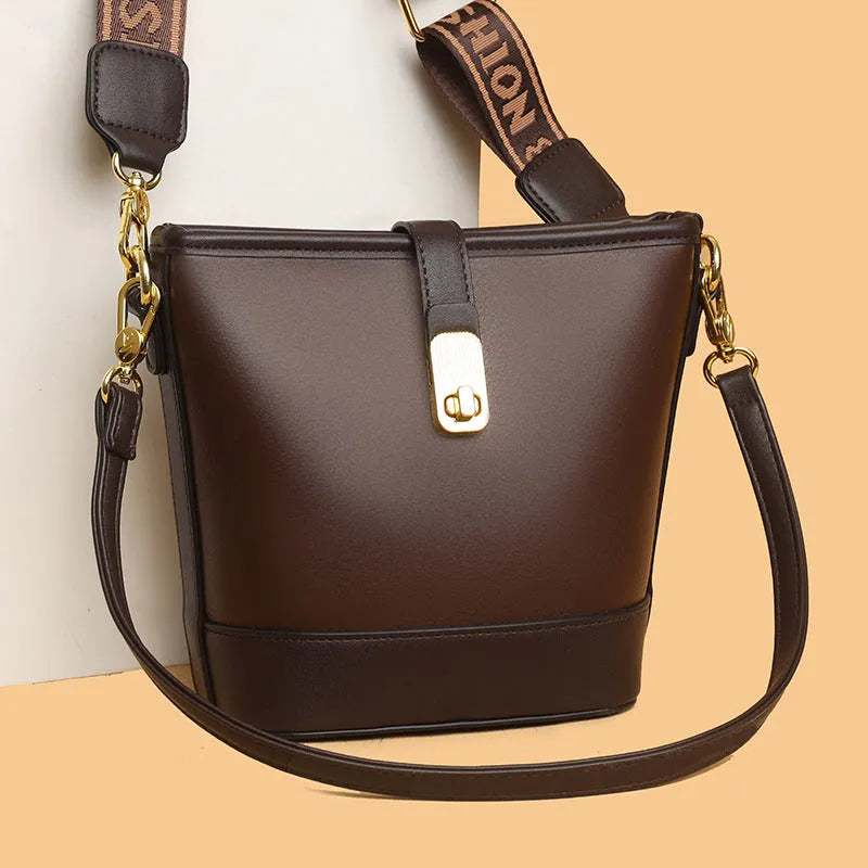 Soft black PU leather bucket bag with double shoulder straps and multiple compartments