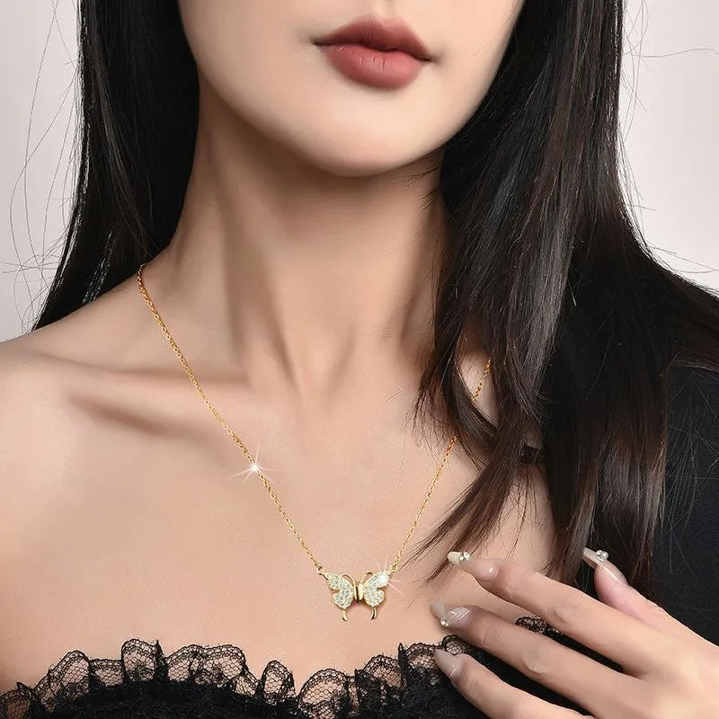 Gold magnetic snap butterfly necklace on twisted chain, adjustable 40-45cm length, titanium steel construction
