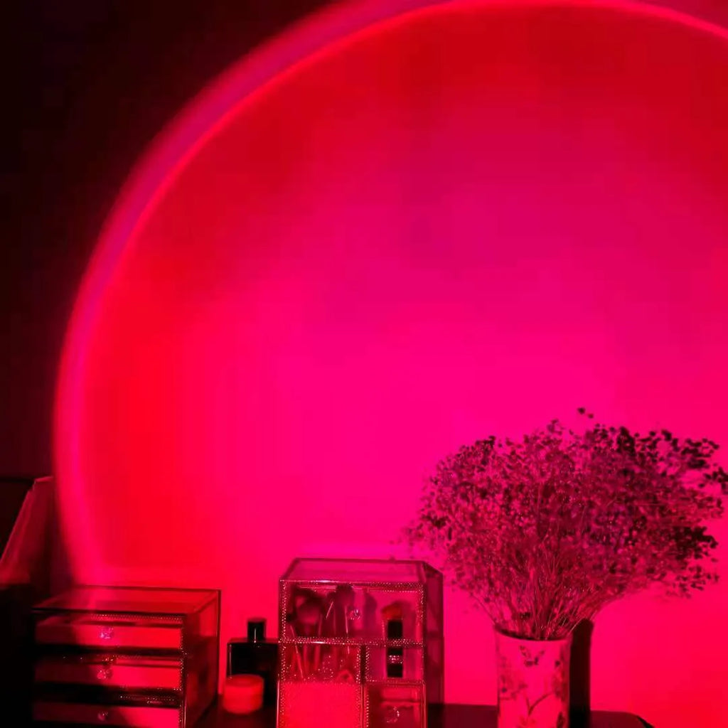USB rechargeable rainbow projection lamp showing sunset red colour projection on wall
