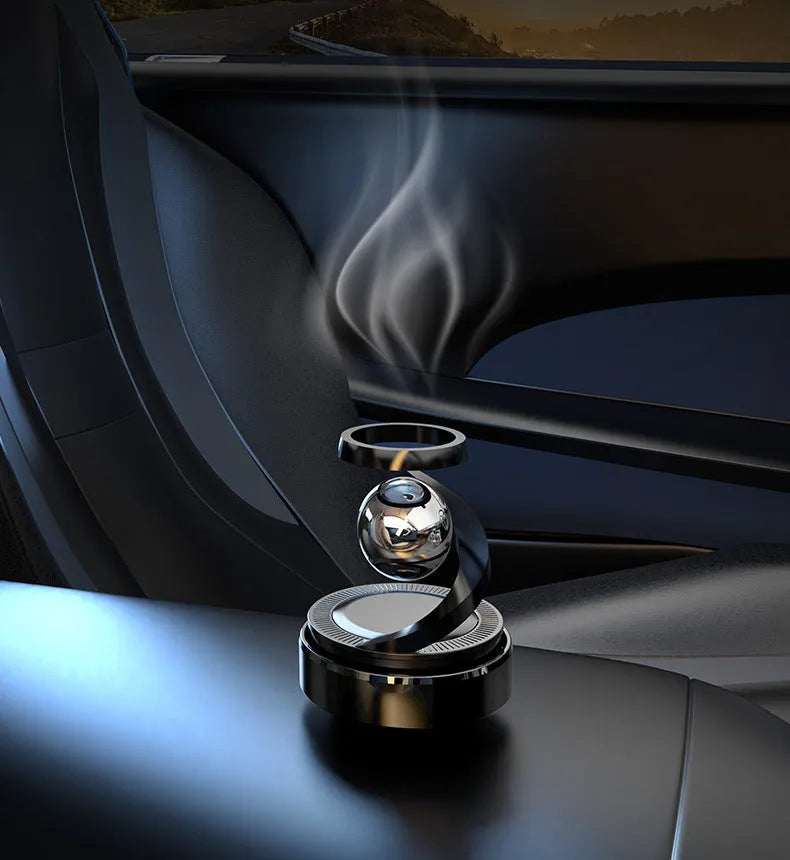 Solar-powered car perfume with decorative design and fragrance dispenser for vehicle interiors