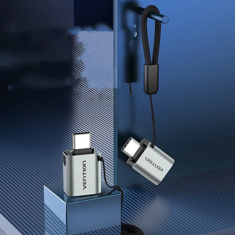 Grey aluminium alloy USB 3.0 C Male to A Female OTG adapter with attached lanyard