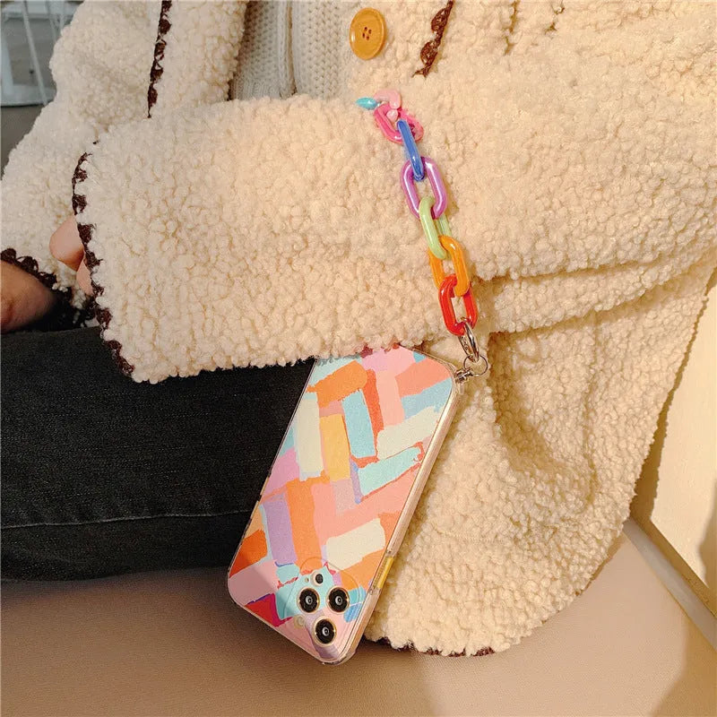 Colourful graffiti patterned phone case with built-in bracelet strap for iPhone models