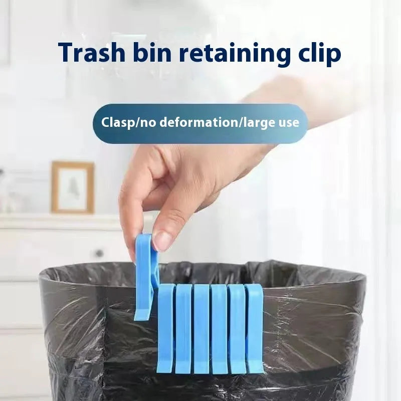 Black plastic non-slip clip for holding bin bags on the side of a trash can.