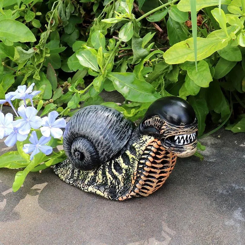 Minimalist white resin snail sculpture on a wooden surface for home or garden decor.