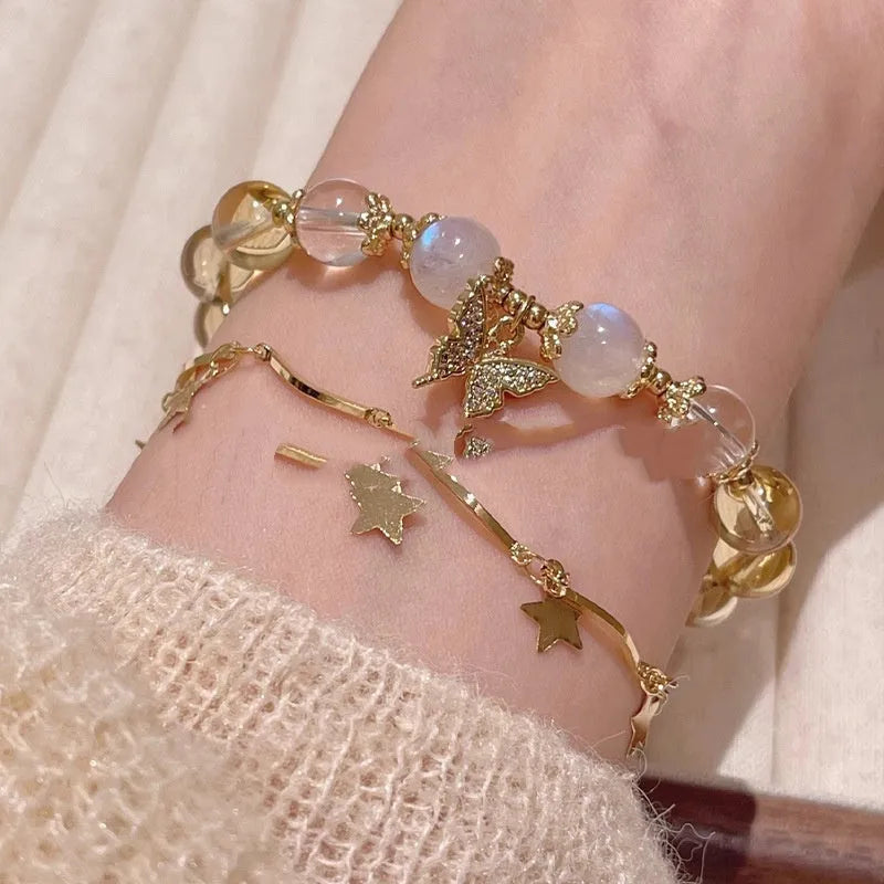 Moonstone white crystal bracelet with diamond-shaped beads and citrine butterfly charm in Chinese style design