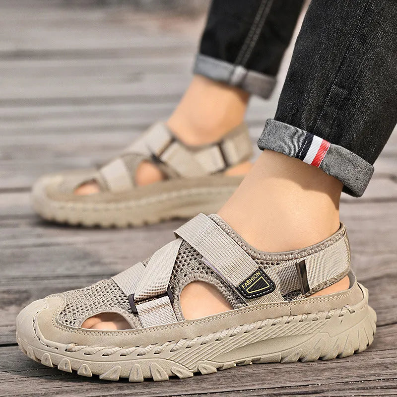 Men's casual sandals with hollow mesh surface and genuine leather upper in grey colour