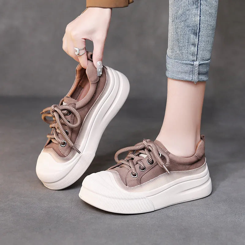 Women's yellow full grain cow leather lace-up casual shoes with round toe and rubber sole.