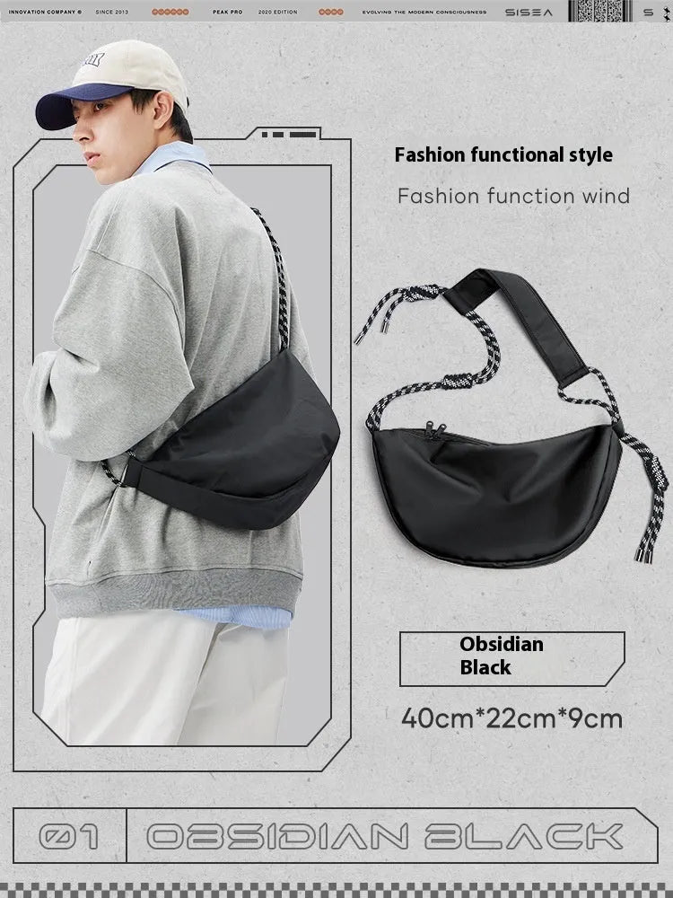 Men's lightweight nylon messenger bag in a solid colour, shown with a large main compartment.